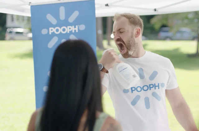 Pooph Commercial man spraying pooph in mouth to non toxic spray